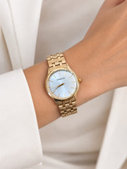 Relógio Feminino Comparatto Analógico Dourado com Mostrador Azul Claro e Pulseira Metálica
